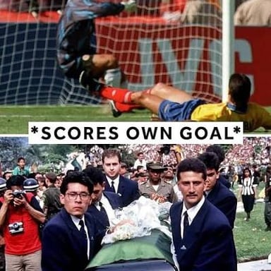 A soccer match scene depicting a player scoring into their own team’s net.