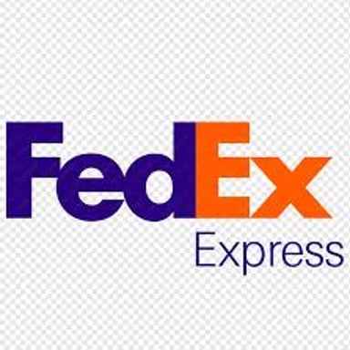 A FedEx delivery vehicle displaying the company’s purple-and-orange branding.