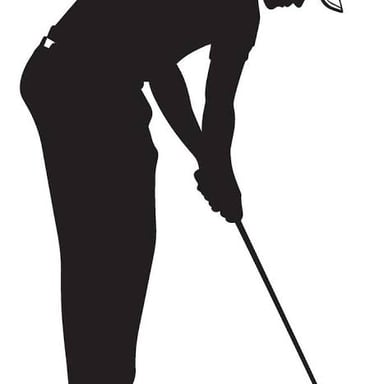 A golfer setting a ball on a tee before making a drive.