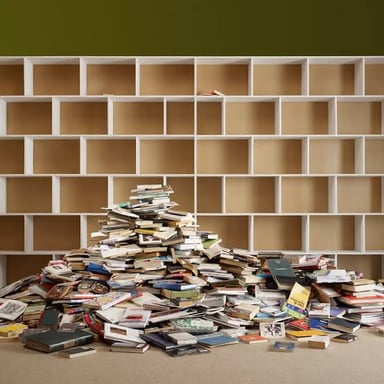 A tidy stack of books piled one on top of another.