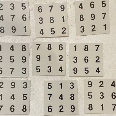 Completed sudoku grid containing the digits one through nine