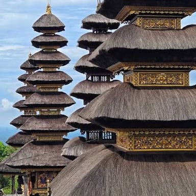 A Buddhist pagoda rising in several tiers above its temple grounds.