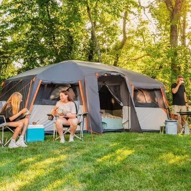 A camping tent with its fabric entrance open.