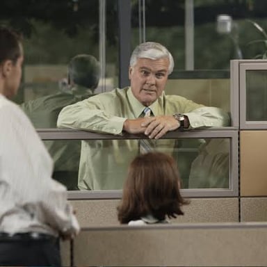 A person gives a small shrug, suggesting acceptance of a disappointing situation.