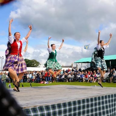 Dancers performing a Scottish country reel.