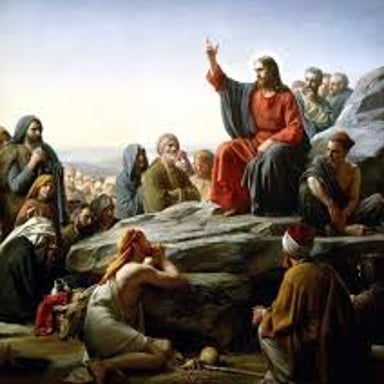 An artistic depiction of Jesus teaching a crowd, evoking the Sermon on the Mount and its Beatitudes.