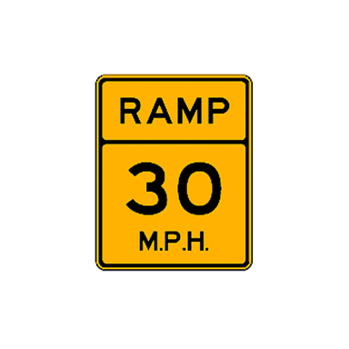 A highway off-ramp marked with an exit sign