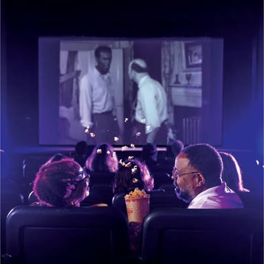 A small cinema auditorium set up for a film screening.