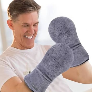 A pair of hands covered by mittens.