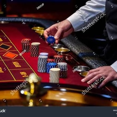A casino croupier stands at a gaming table with players nearby.