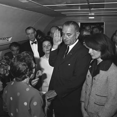 An official taking a formal oath during a swearing-in ceremony