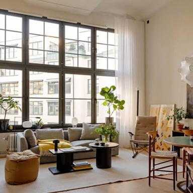 An open-plan apartment with high ceilings and few interior walls.