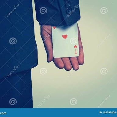 An ace playing card tucked into the cuff of a sleeve