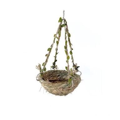 A tree limb bearing a leaf and bird’s nest, with a bird perched nearby and a swing hanging from the branch.