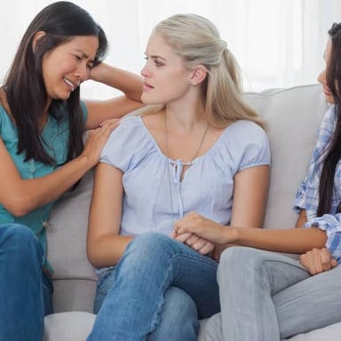 A person showing disbelief during a conversation.