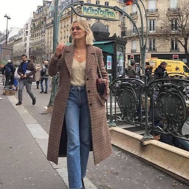 A stylish fashion scene associated with Parisian style.