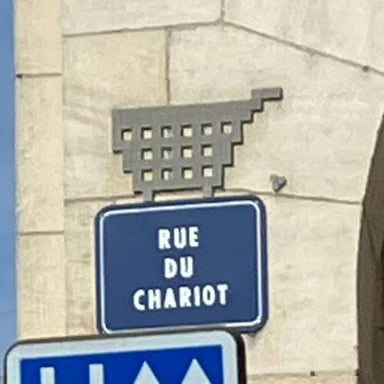 A street in Bayonne, France, where French is spoken.
