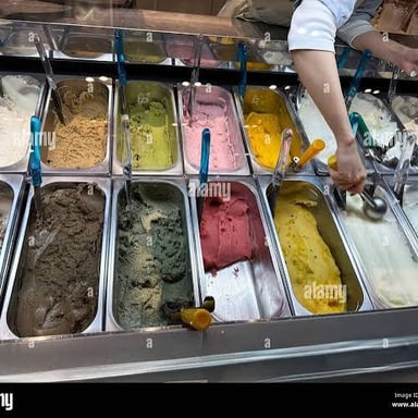 Gelato, a dense Italian frozen dessert, displayed in several flavors.