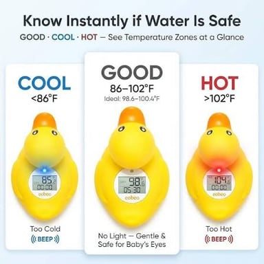 A thermometer beside a glass of lukewarm water.