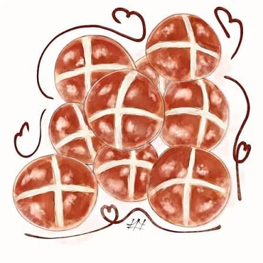 Hot cross buns displayed in a bakery.