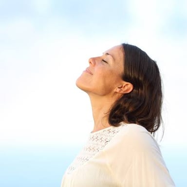 A person taking a deep breath