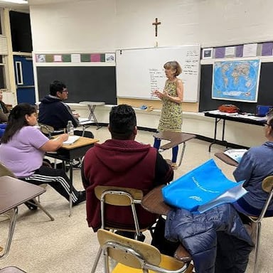 Students attending an English-language learning class