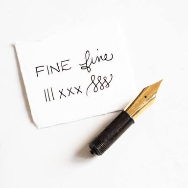 Close view of a fountain pen’s metal nib, the point that touches the paper.