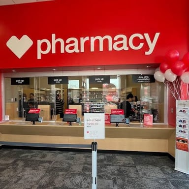 A CVS Pharmacy storefront with its recognizable sign.