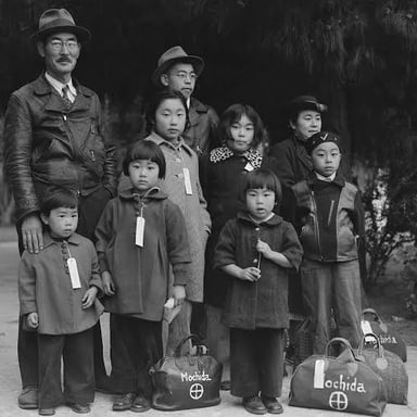 A Japanese American family representing the Nisei generation and their immigrant parents.