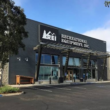 An REI outdoor equipment store displaying gear for activities such as climbing.