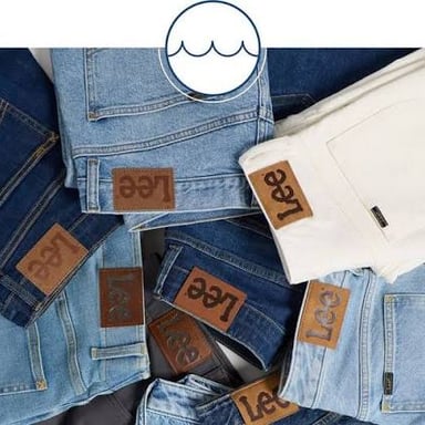 Lee denim jeans displaying the brand name on a waistband label.