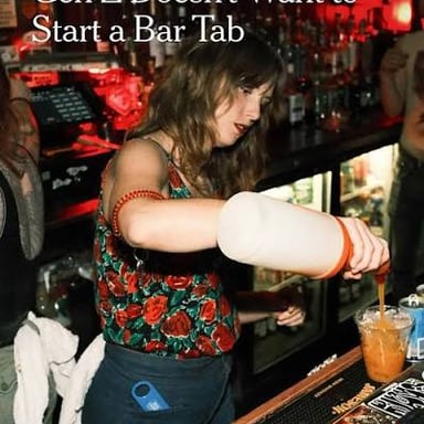 A customer at a bar having purchases added to a running tab.