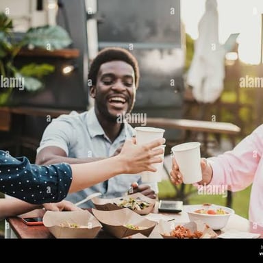 A person enthusiastically eating a meal
