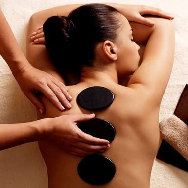 Smooth heated stones arranged for a spa massage