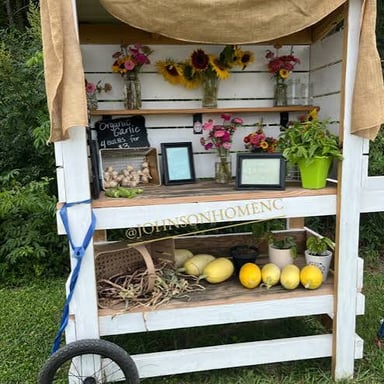 Fresh produce displayed at an outdoor farm stand