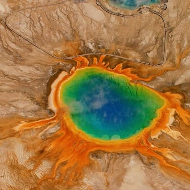 A broad volcanic caldera landscape, showing the large depression formed by collapse.