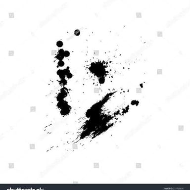 A dark ink smear marring a sheet of white paper