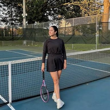 A tennis player wearing a skort, a skirt-like garment with shorts