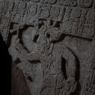 Stone architecture and carved hieroglyphic inscriptions associated with the ancient Maya civilization.