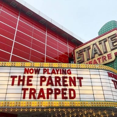 A venue sign reading “Standing Room Only.”