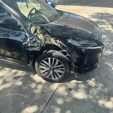 A badly damaged car illustrating what it means for a vehicle to be totaled.