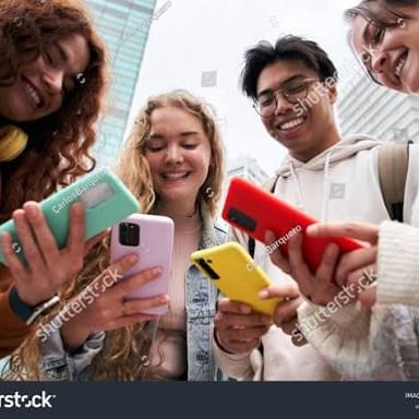 One person holds a phone out to take a selfie with a group of friends.