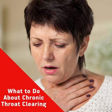 A person clearing their throat before speaking
