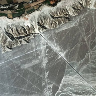Aerial view of a Nazca Lines geoglyph in the Peruvian desert.