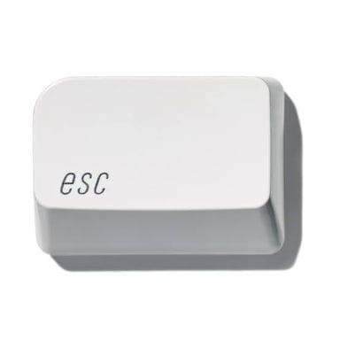 A computer keyboard with the Escape key visible.