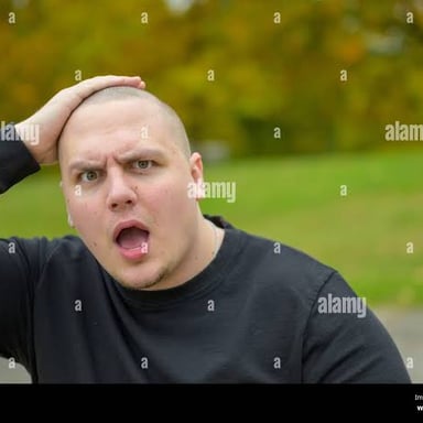 A person looking startled and horrified