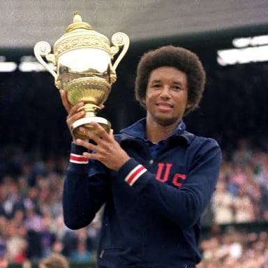 Arthur Ashe playing tennis.