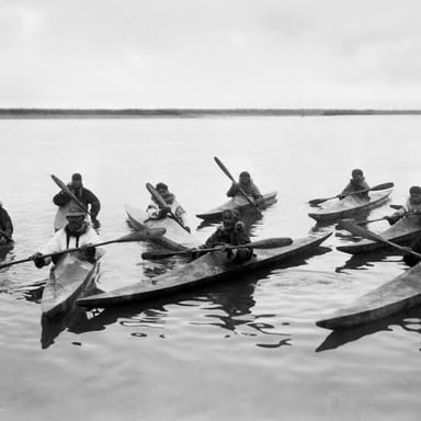 A traditional Inuit kayak on the water.