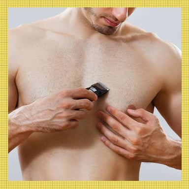 Man grooming or removing hair from his chest