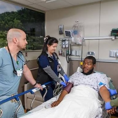 Doctors in an emergency room, one group among the clinicians and staff who work there.